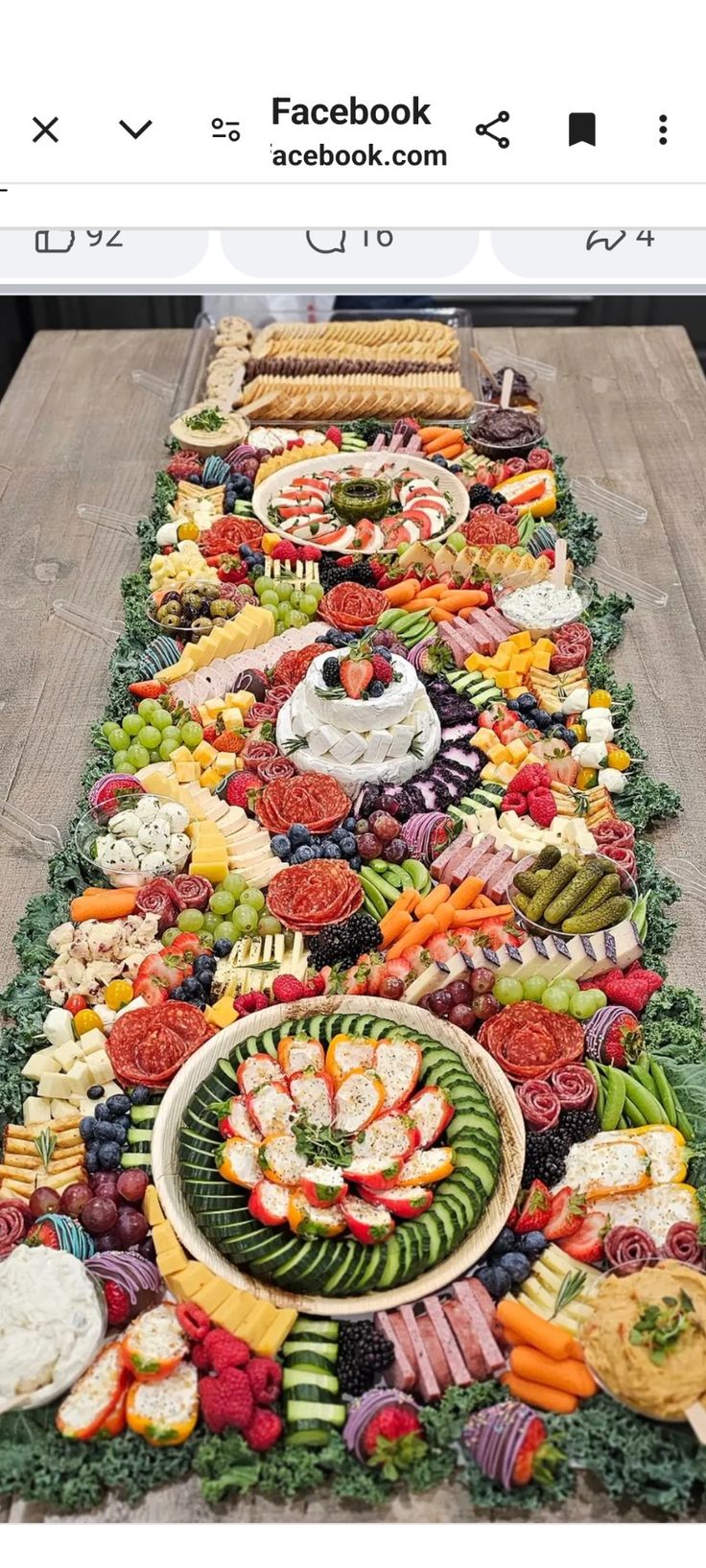 a long table covered in lots of different types of food