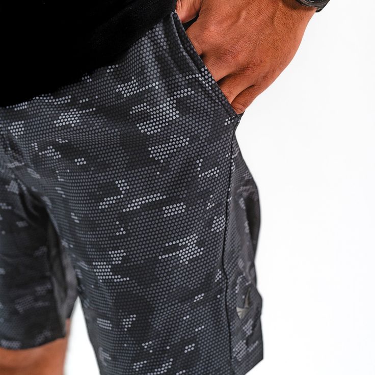 Embrace the epitome of athleisure with our Recon Shorts. These shorts are masterfully crafted from 88% Polyester and 12% Spandex, ensuring flexibility and comfort. Perfect for the gym or a casual day out, they offer functionality, with each color representing a different military branch. --- Volition America is a proud supporter of the Folds of Honor Foundation, which provides educational scholarships to spouses and children of America's fallen and disabled service-members and first responders. Casual Athletic Shorts With 4-way Stretch For Training, Casual Athletic Shorts For Training With 4-way Stretch, Casual 4-way Stretch Athletic Shorts For Training, Urban Activewear For Gym With Go-dry Technology, Urban Moisture-wicking Activewear For Gym, Urban Black Activewear With Side Pockets, Urban Style Moisture-wicking Activewear For Training, Athleisure Athletic Shorts With Elastic Waistband For Gym, Relaxed Fit Athletic Shorts For Training