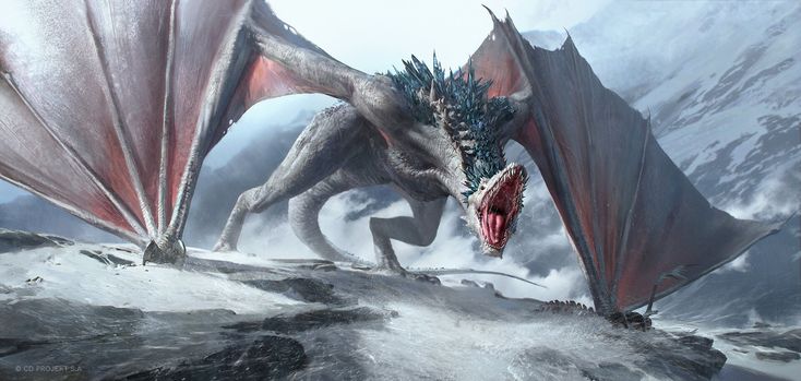 a white dragon with red wings on top of a mountain