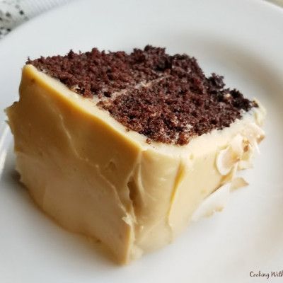 a piece of cake sitting on top of a white plate