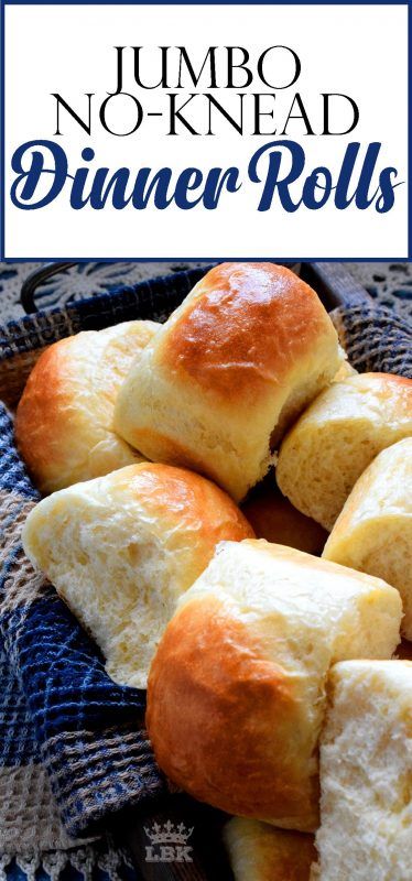 a pile of dinner rolls sitting on top of a blue and white cloth with the words jumbo no - knead dinner rolls