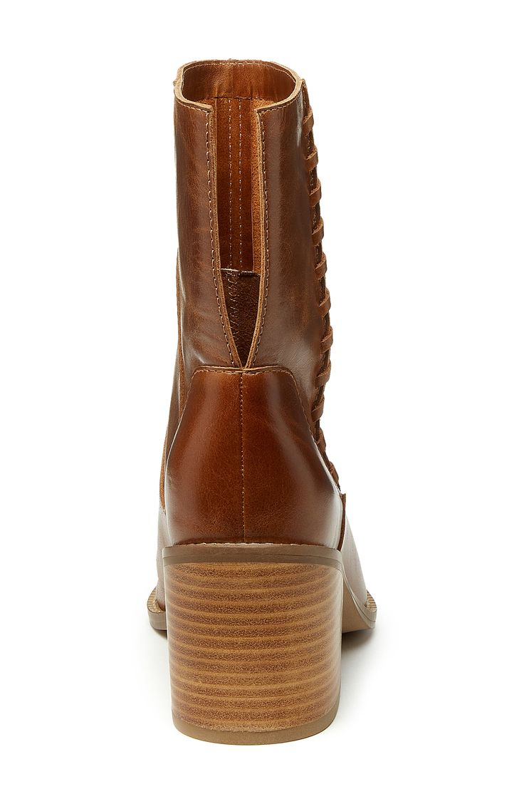 A notched shaft adds interest to a stacked-heel bootie fashioned with a padded insole for enhanced comfort. 2 3/4" heel 6 1/2" shaft Pull-on style Cushioned insole with arch support Synthetic upper, lining and sole or textile upper and lining/synthetic sole Imported Fall Mid-calf Boots With Stacked Low Heel, Western Heeled Boots With Stacked Low Heel, Western Mid-calf Boots With Stacked Block Heel, Brown Snip Toe Booties For Fall, Fall Brown Snip Toe Booties, Lace-up Ankle Boots With Stacked Heel, Brown Western Style Booties Medium Width, Medium Width Lace-up Ankle Boots With Stacked Heel, Leather Booties With Stacked Heel And Snip Toe