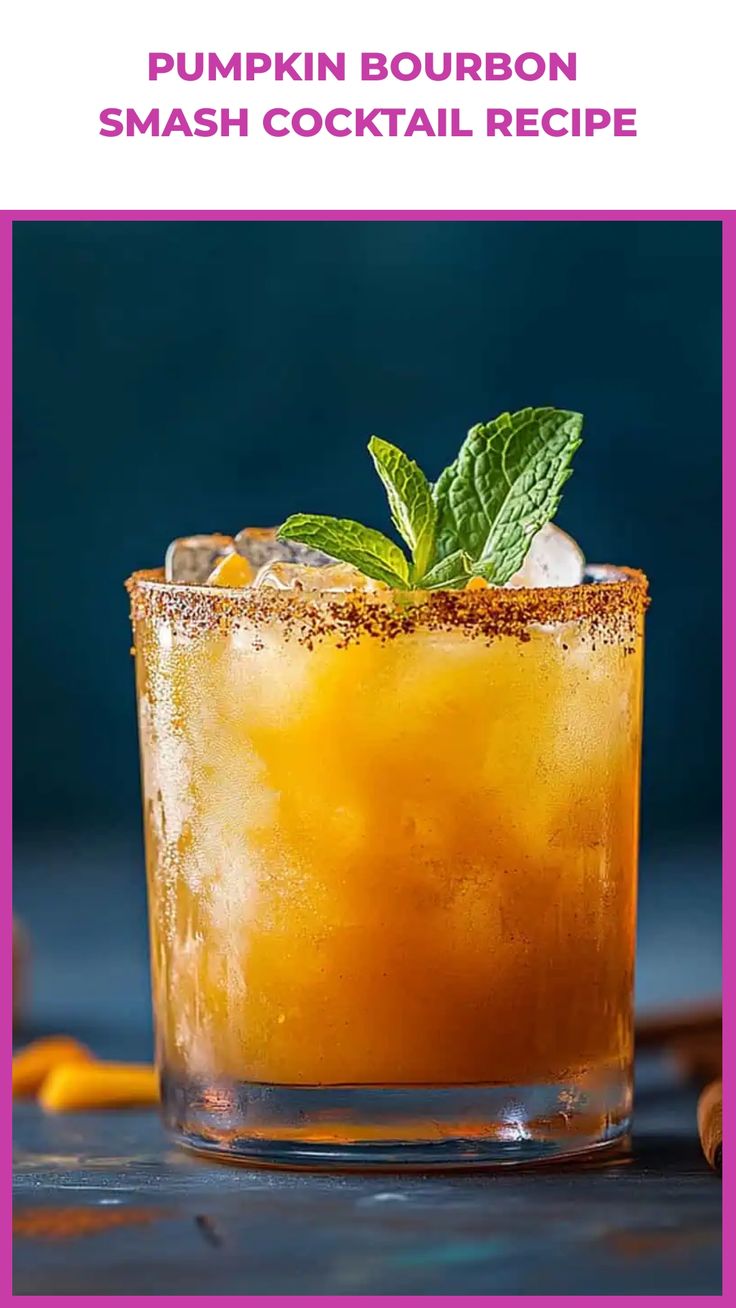 the pumpkin bourbon smash cocktail is garnished with mint