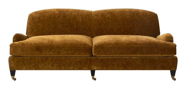 a brown couch sitting on top of a white floor