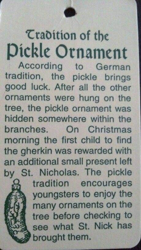 a sign describing the origin of the pickle ornament