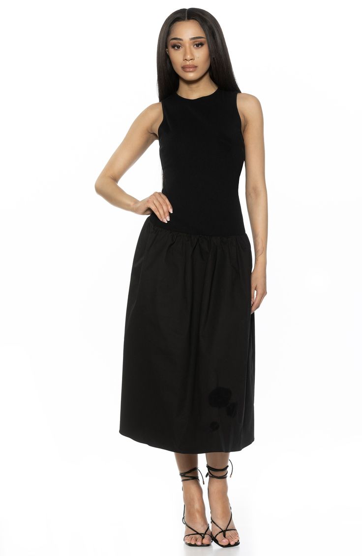 A gathered drop-waist skirt creates the glam silhouette of a sleeveless dress with sporty work-to-weekend versatility. 51 1/2" length (size X-Small) 100% cotton Machine wash, line dry Imported Fitted Sleeveless Dress With Pleated Hem, Black Midi Dress With Gathered Waist For Evening, Black Fitted Dress With Gathered Skirt, Black Midi Dress With Pleated Waist For Spring, Fitted Black Dress With Gathered Skirt, Black Midi Dress With Gathered Waist For Work, Chic Sleeveless Midi Dress With Voluminous Skirt, Black Skirted Dress For Work, Black Summer Dresses With Gathered Skirt