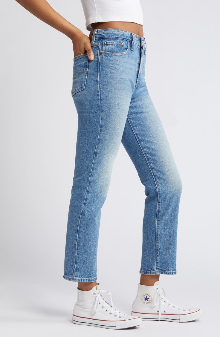 Inspired by cheeky vintage Levi's styles, these low-stretch jeans in a sanded medium wash hug the hips to showcase your curves to greatest effect. Distressed hems add lived-in character to the casual look. 15" leg opening; 11" front rise; 14 1/2" back rise (size 29 x 28) Button fly 99% cotton, 1% elastane Machine wash, tumble dry Imported Levis Jeans Outfit, Levi Jeans Outfit, Jean Levis, Shopping Trip, Jean Outfits, Stretch Jeans, Her Style, Straight Leg Jeans, Leg Jeans