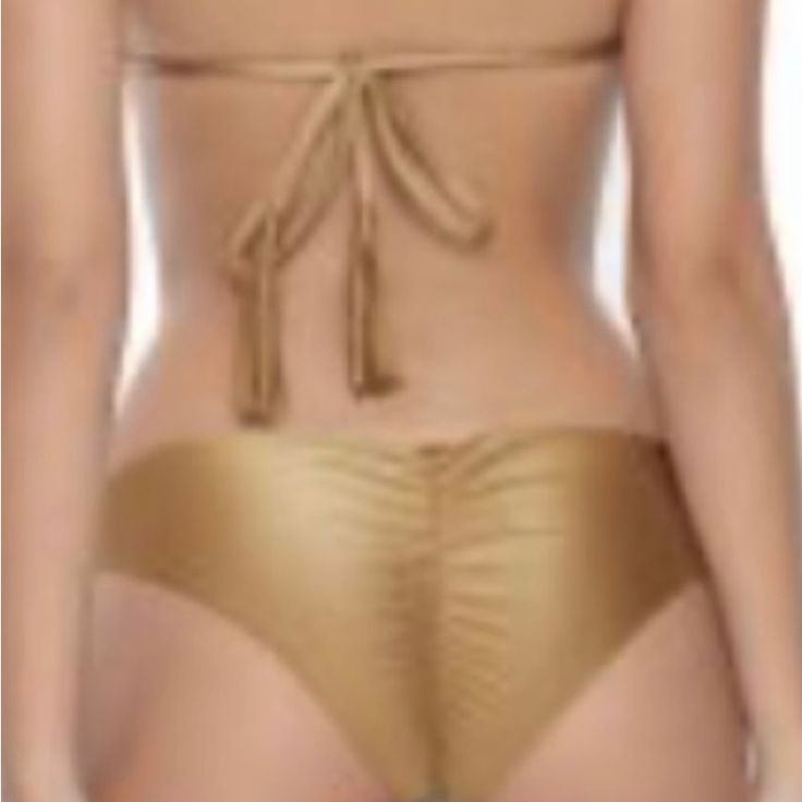 Questions? Leave A Comment Below! Gold Tie-side Bottoms For Beachwear, Gold Bottoms For Beach Season, Beachwear Swimwear With Ruched Sides For Vacation, Vacation Beachwear Swimwear With Ruched Sides, Ruched Sides Swimwear For Vacation, Gold Beachwear Bottoms For Vacation, Gold Tie-side Bottoms For Summer, Gold Bottoms For Summer Pool, Gold Bottoms For Summer Pool Activities