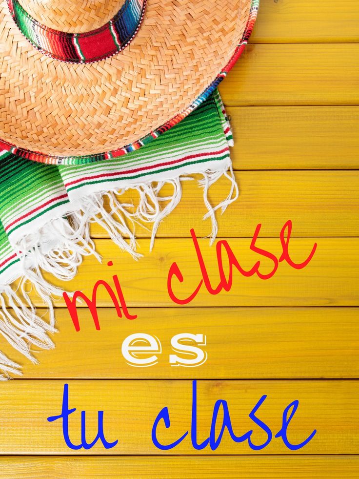 a straw hat and scarf with the words mi classe des tu clase