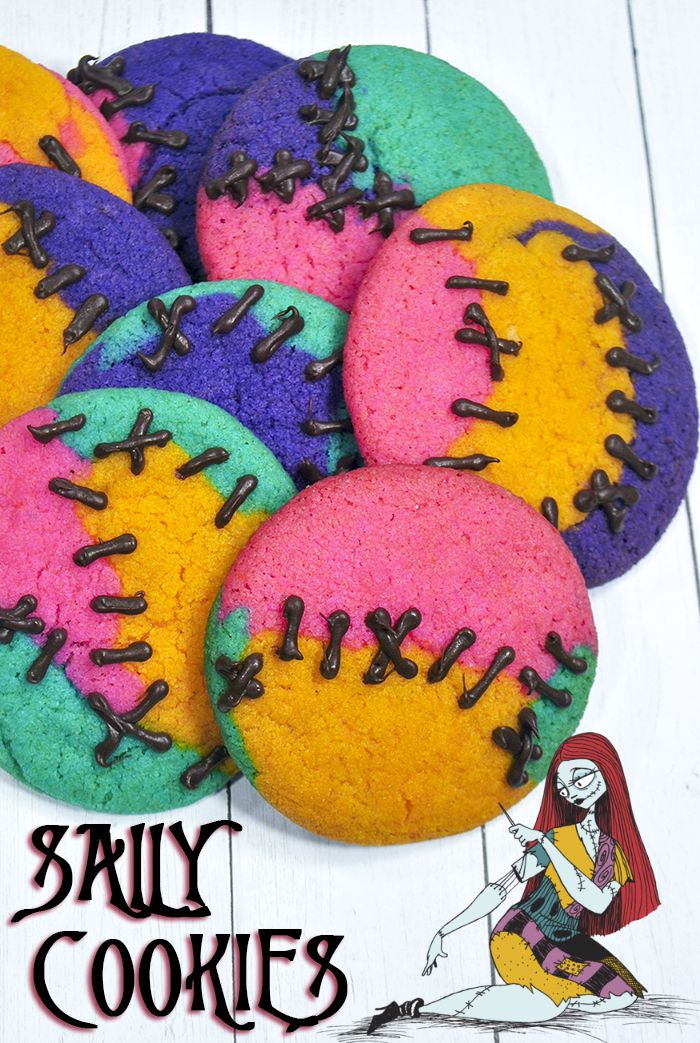 colorful cookies with sprinkles on them are displayed in front of a white background