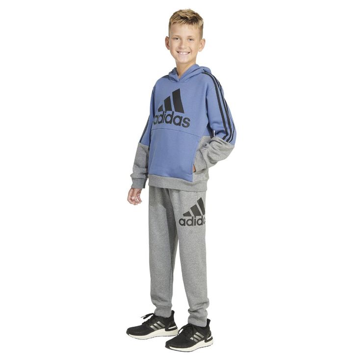 Adidas Youth Fleece Hoodie Colors: Blue Pull-Over With Hood Elastic Cuffs And Hem Functional Front Pocket Pouch Three Stripe Detail Down Arms Made In Vietnam Content: 58% Cotton | 42% Polyester Sizing: Sizes: S(8) | M(10/12) | L(14/16) | Xl(18/20) For Reference : Pit To Pit (In): S(8)=16.5" / M (10/12)=18" / L (14/16)= 19.5" / Xl (18/20)= 20.5" Front Length ( Shoulder To Hem ) (In): S (8)= 21.5" / M (10/12)= 22.5" / L(14/16)=25" / Xl (18/20)= 26.5" . Blue Fleece Sportswear Hoodie, Blue Fleece Hoodie Sportswear, Adidas Fleece Sportswear Hoodie, Blue Sportswear Sweats For Fall, Blue Fleece Sweats For Sportswear, Blue Fleece Sweats Sportswear, Blue Athleisure Sweats For Winter, Winter Blue Sweats With Drawstring Hood, Blue Sporty Hooded Sweats