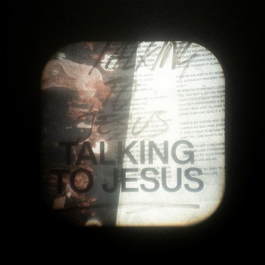 the words i am king to jesus are shown through an airplane window