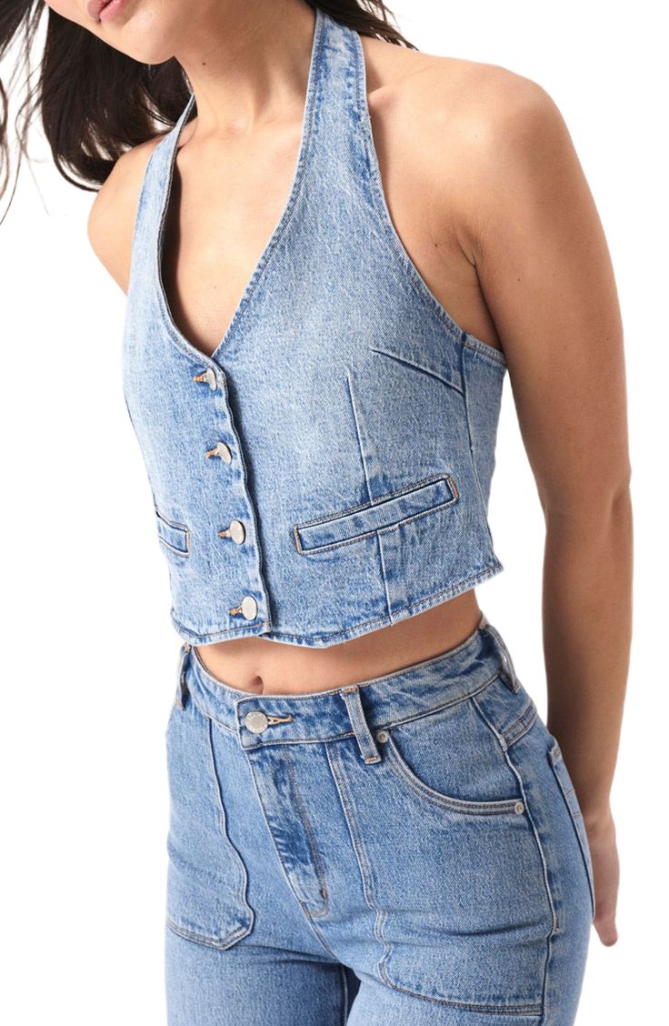 This faded denim top is crafted in a cropped silhouette and designed with a sleek halter neck. 18 1/2" center front length; 16 1/2" center back length (size Medium) Halter neck 99% organic cotton, 1% elastane Machine wash, line dry Imported Fitted Sleeveless Dark Wash Crop Top, Fitted Sleeveless Crop Top In Medium Wash, Fitted Dark Wash Sleeveless Crop Top, Sleeveless Denim Blue Crop Top, Fitted Denim Sleeveless Crop Top, Fitted Denim Halter Top For Spring, Trendy Sleeveless Medium Wash Crop Top, Trendy Medium Wash Sleeveless Crop Top, Spring Cropped Light Wash Denim Vest