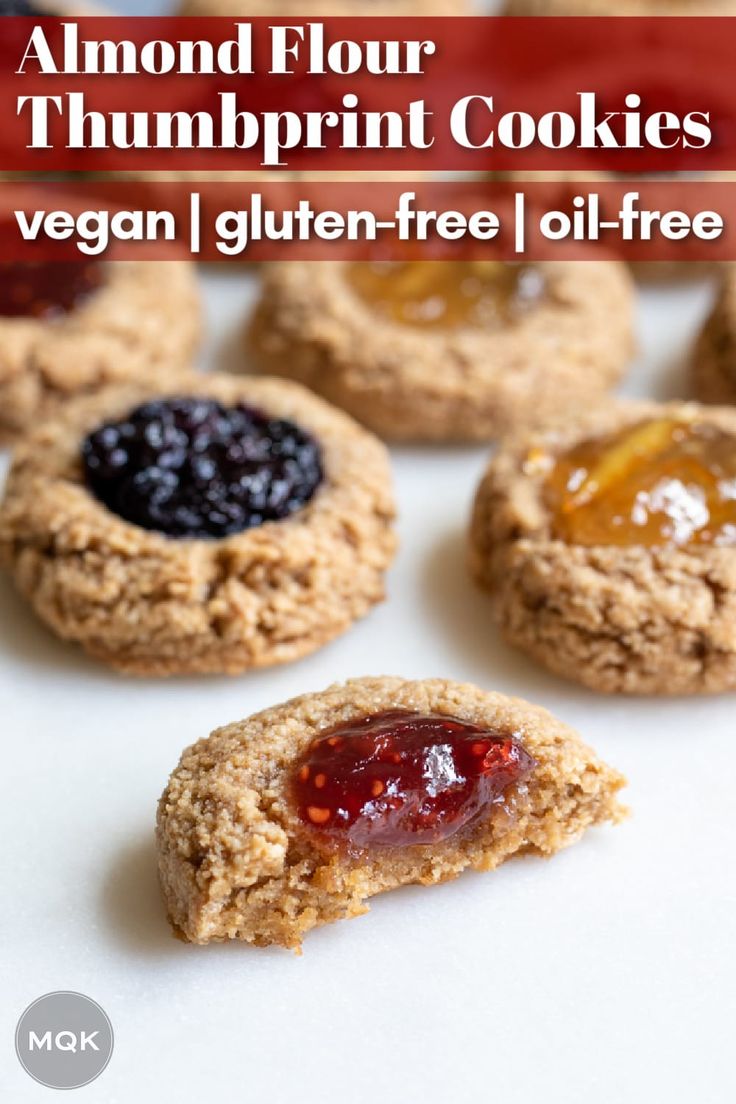 an image of cookies with jam on them and the words almond flour thumbprint cookies vegan gluten free oil - free