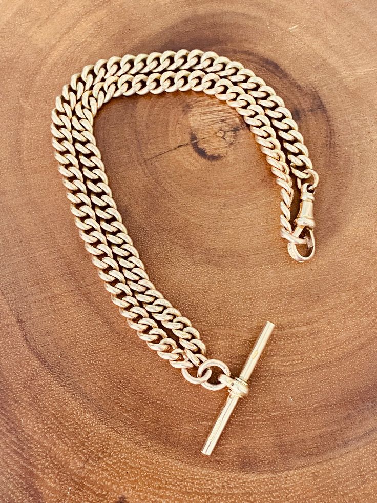 "This is a classic antique Albert chain necklace. The 9K yellow gold necklace (with a hint of rose gold)  measures 14 1/2 inches with a secure dog clasp. Links measure 5mm wide. The T bar measures 1 3/8 inch. All links, clasp and t-bar are stamped \"9-375\". Weight 39.4 grams. Please visit my shop- CarterJewelry22- to see more beautiful antique and vintage jewelry pieces! Also follow me on Instagram- CarterJewelry." Antique Gold Chain Link Necklace, Vintage Gold Necklace With Hooks And Links, Antique Gold Curb Chain Necklace, Vintage Gold-tone Chain Necklace With Coin Pendant, Antique Yellow Gold Chain Link Necklace, Chains Necklace, Jewelry Pieces, Necklace Etsy, Chain Necklace