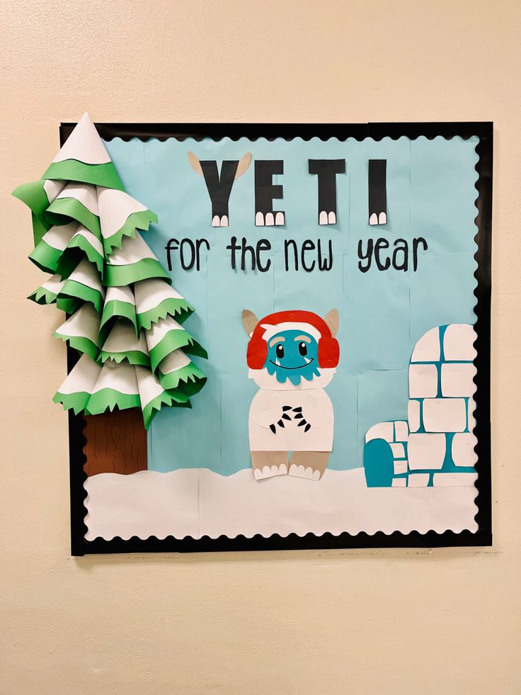 a paper cutout of a yeti for the new year hanging on a wall