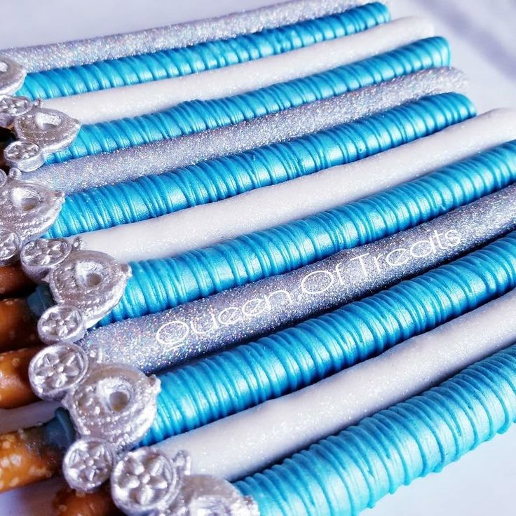 there are many blue and white beads on the ends of each beaded bracelets