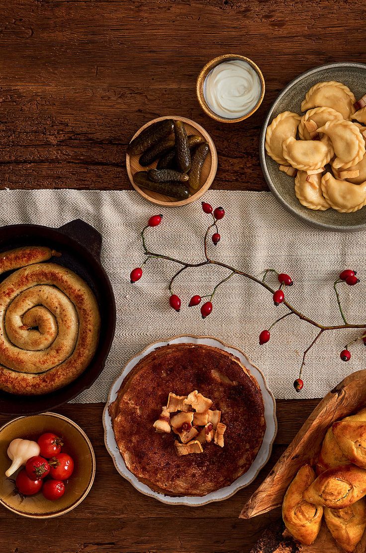 a table topped with lots of different types of food