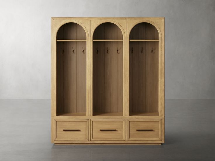 an empty wooden cabinet with three drawers