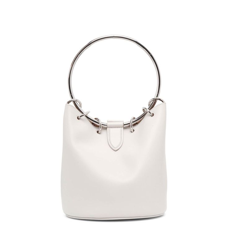 White leather bucket bag from Alaïa. The Ring medium bag is made of white leather with a silver-finish top-handle, magnetic fastening and internal leather pouch to fit all your belongings.Measurements: L19 x H19 x W19 cmMade in Italy Modern Bucket Shoulder Bag With Silver-tone Hardware, Silver Bucket Bag With Dust Bag Included, Modern White Shoulder Bag With Metal Hardware, Modern Shopping Bucket Bag With Silver-tone Hardware, Chic Bucket Bag With Silver-tone Hardware For Shopping, Chic Silver Leather Bucket Bag, Chic Shopping Bucket Bag With Silver-tone Hardware, Modern Bucket Bag With Silver-tone Hardware, White Leather Bag With Metal Hardware