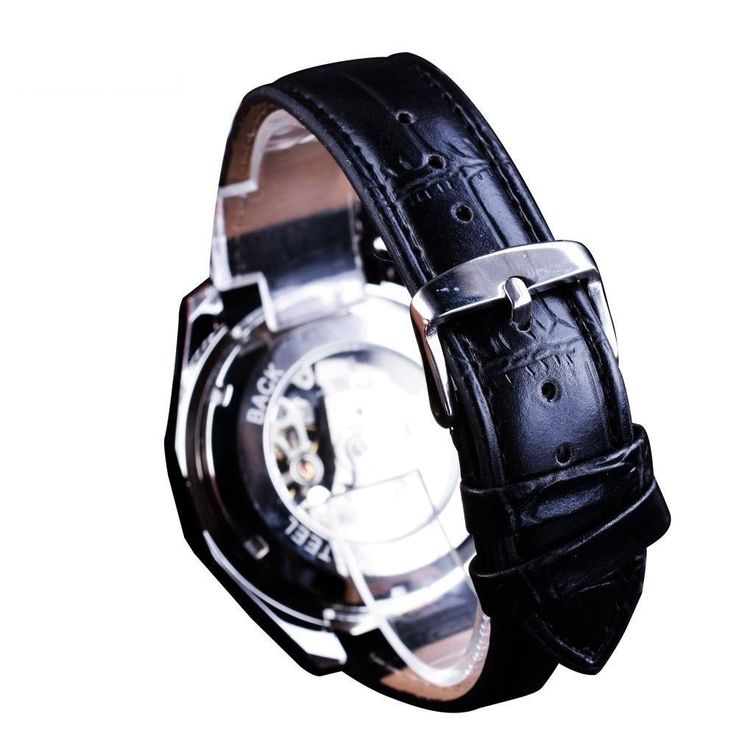 This steampunk watch is made of a stainless steel case with a leather band that is secured by the buckle clasp. Incorporating a military design into your elegant look, this ultimate watch is beautified with silver and black. The transparent, skeleton dial of this exclusive watch is truly unique, as is its automatic, self-wind movement. Wear this attractive watch to any event and get noticed in seconds. Steampunk Men, Steampunk Watch, Military Design, Skeleton Watches, Military Inspired, Stainless Steel Band, Wristwatch Men, Sport Watches, Mechanical Watch