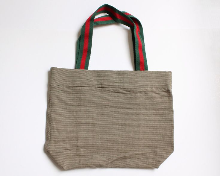 "Large khaki color tote bag.  Perfect minimalism.   ► Magnetic snap button ► Bag size: 15 1/2\" (39 cm) width x 12 1/4\" (31 cm) height x 4\" (10 cm) base ► Handle: 20 1/2\" (52 cm) in length, 1 1/2\" (3.8 cm) width ► No inner layer ► One inner pocket to carry your small objects ► Fabric: 100% cotton One of a kind bag.  Only one available. SHIPPING - All mailings are sent from Hong Kong. Delivery usually takes around 5-18 days. Occasionally it may take longer arriving time like 3-4 weeks due to aviation security measures, customs held up, extreme weather conditions, or during peak seasons. - More shipping information can be found at: http://www.etsy.com/shop/totebagmom/policy [170270]" Khaki Canvas Tote Bag With Canvas Lining, Rectangular Khaki Canvas Bag With Handles, Khaki Canvas Tote Bag For Daily Use, Khaki Tote Canvas Bag For Daily Use, Khaki Canvas Tote Bag, Khaki Cotton Shoulder Bag For Daily Use, Khaki Canvas Tote Bag For Everyday, Khaki Canvas Bag With Handles, Khaki Canvas Bag