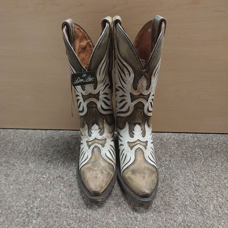 Dan Post Women's Ndulgence Snip Toe Brown Leather Western Cowboy Boots Distressed Brown Leather Boot. Geometric Inlay Detail On Shaft And Foot. Medium Cowboy 1" Heel 11" Shaft Snip Toe Easy Pull On And Off Tabs. Ultimate Flex Insole. Leather Outsole. Dp4359 White Country Boots For Fall, Cream Boots With Reinforced Heel And Snip Toe, Cream Snip Toe Boots With Reinforced Heel, Western Cream Boots With Reinforced Heel, Cream Western Boots With Reinforced Heel, Western Style Cream Boots With Reinforced Heel, White Pointed Toe Boots For Western-themed Events, White Western Boots For Western-themed Events, White Leather Boots For Western-themed Events