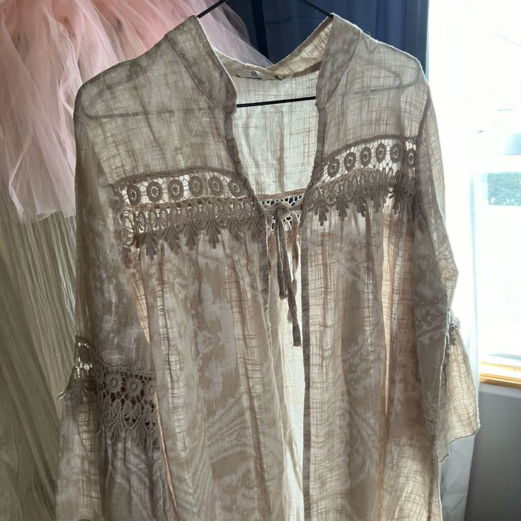 Absolutely Stunning 100% Cotton Jacket/ Shirt/ Cove-Up With Lace Accents And Flared Sleeve Details. Made In Italy And Perfect For Summer! New Without Tags, Never Worn. All Items Are As-Is And Final Sale, Ask For Any Needed Clarification Before Purchasing. Bundle For Deep Discounts! Neutral V-neck Beach Top, Casual Beige V-neck Cover-up, Beige V-neck Top For Beach Cover-up, Long Sleeve Beige Tops For Vacation, Beige Long Sleeve Tops For Vacation, Casual Beige Tunic Top, Casual Brown Beach Blouse, Beige Summer Tops For Beach Season, Neutral Long Sleeve Top For Summer