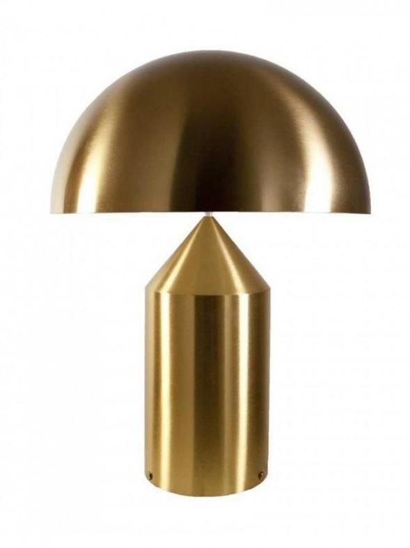 an image of a gold lamp on a white background