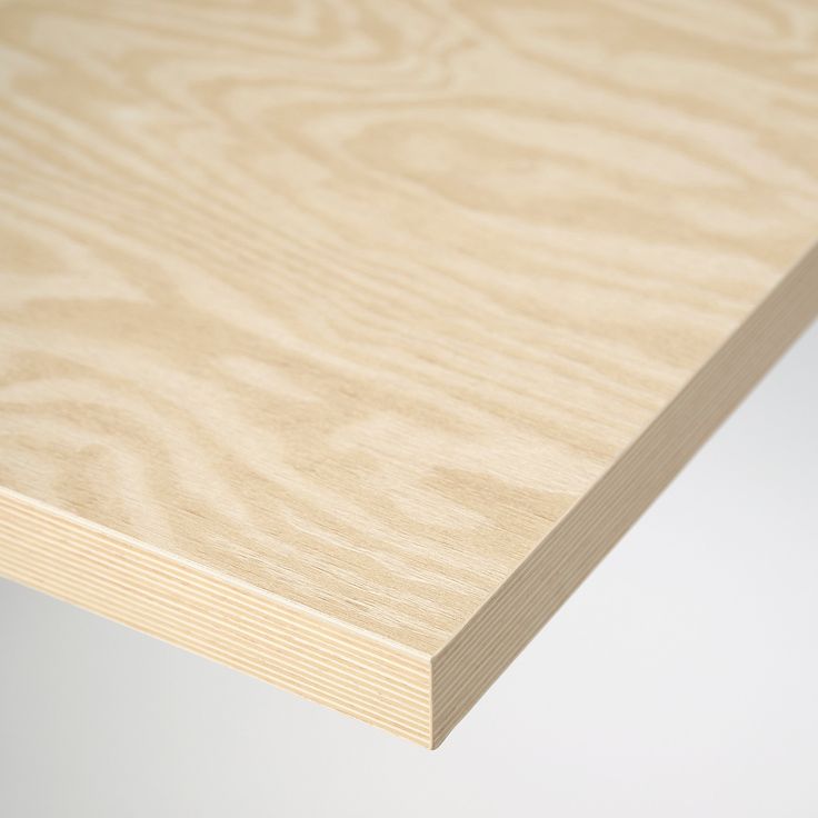 a close up view of a plywood surface