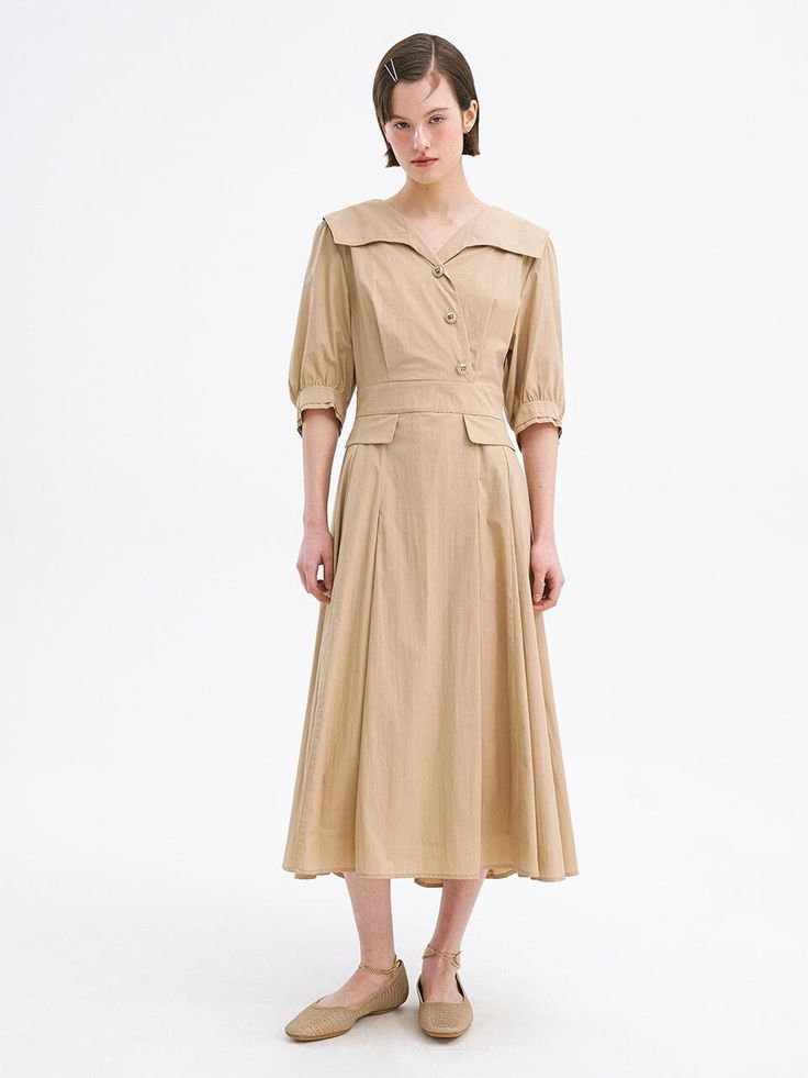 This is a feminine and modern dress by OLIVE DES OLIVE that is made out of high quality and sturdy material. With distinctive mood of the design and comfortable wear, you can style it for your casual daily outfit.- Crispy texture of the fabric- Natural shirring on the back waist banding- Flared silhouette- Trendy and feminine mood Chic Khaki Dress For Daywear, Solid Cotton Midi Dress For Work, Collared Beige Midi Dress For Office, Fitted Khaki Midi Dress For Work, Relaxed Fit Midi Dress For Workwear, Elegant Khaki Midi Dress For Work, Cotton Midi Dress For Work With Relaxed Fit, Relaxed Fit A-line Midi Dress For Work, Khaki Knee-length Midi Dress For Work