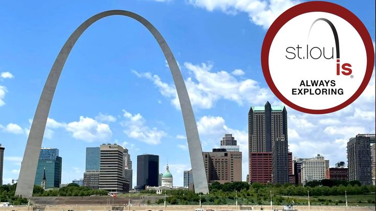 an advertisement for st louis is displayed in front of the gateway arch