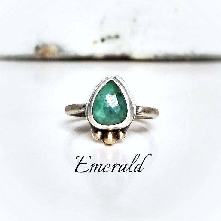 "Genuine 10mm faceted green emerald is handset in oxidized sterling silver with recycled 14k gold mixed metal accents. ~Ring with stone set is a size 7 (can be hammered to 7.25\") ~If you need a different size please choose loose stone and I will create your own custom ring ~Wrapped in black gift box ~Handmade in Tennessee" Emerald Silver Ring, Crossville Tn, Ring With Stone, Gift Box Handmade, Box Handmade, Black Gift Boxes, Custom Ring, Metal Accents, Solitaire Rings