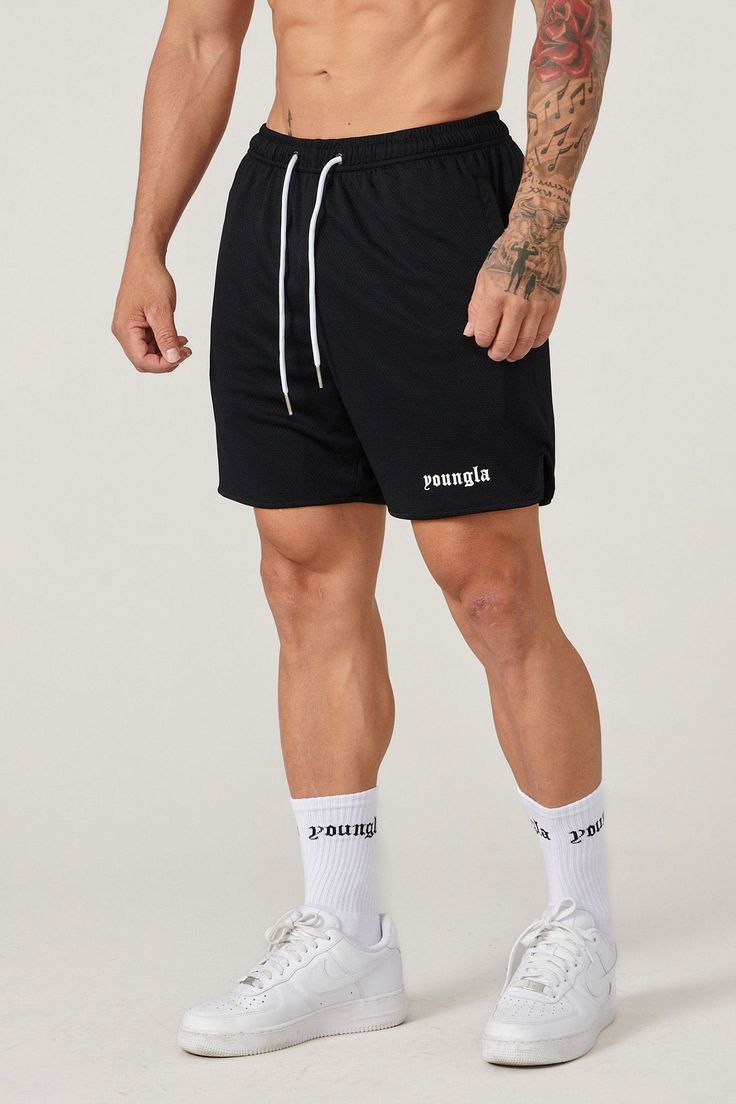 To complete the look, each short comes with a matching socks. MATERIAL: 100% Polyester. FIT: Relaxed. DESIGN: The game-time shorts are the perfect addition to any wardrobe. Made from breathable mesh fabric, these shorts will keep you cool and comfortable during the day. They come in a variety of colors to suit any style. To complete the look, we also added matching socks in each color option. MODEL: The model in the second photo is wearing a size Large. Weight: 228lb Height: 5'11. Matching Socks, During The Day, Game Time, Lifestyle Clothing, Short Leggings, Short Socks, Short Shirts, Carolina Blue, Black Media