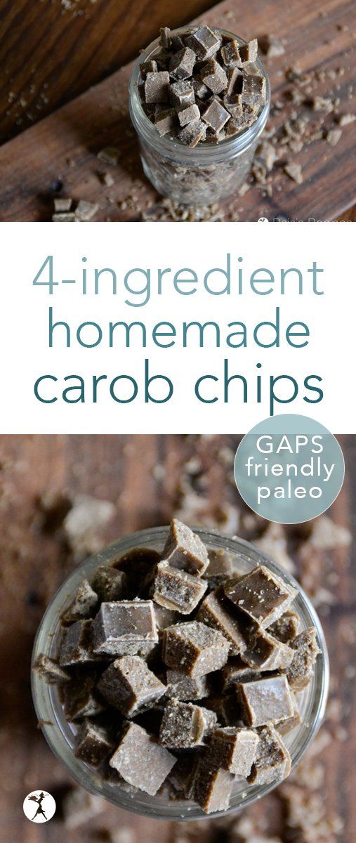 four ingredient homemade carob chips in a glass bowl on top of a wooden table