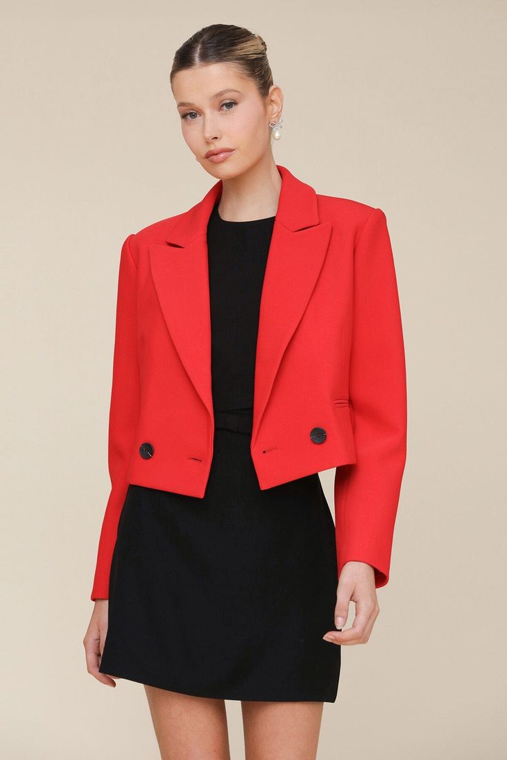 A cool, contemporary cut marries a show-stopping shade to create our statement suit crop blazer, which features peak lapels, shoulder pads, double-breasted button closure, and welt pockets for your essentials. Available in red. Style #: 83914 Chic Red Semi-formal Suit, Modern Cropped Jacket With Notch Lapel For Formal Occasions, Fitted Red Blazer With Double Button Closure, Formal Cropped Outerwear With Double-breasted Button, Chic Red Notch Lapel Suits, Elegant Cropped Jacket With Double-breasted Button, Elegant Cropped Blazer With Button Closure, Classic Cropped Jacket For Spring Evenings, Chic Red Tailored Suits