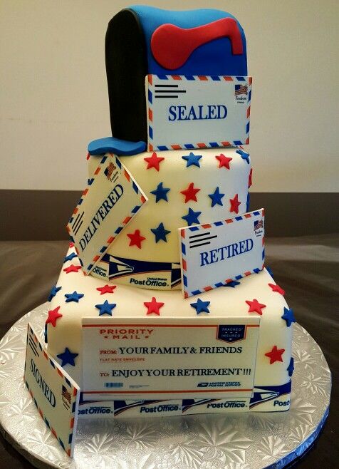 a cake made to look like a mailbox with red, white and blue decorations