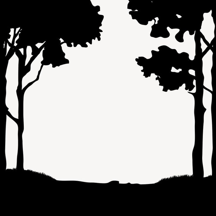 a black and white silhouette of trees on a hill