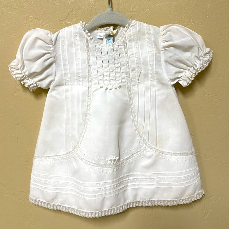 Beautiful Feltman Brothers Crisp White Slip Dress With Hand Embroidered Lace Detailing. Was Purchased For A Baptism, But She Outgrew It Too Quickly. Cotton Baptism Dress With Lining, Cotton Short Sleeve Dress For Baptism, Fitted Short Sleeve Baptism Dress With Ruffles, Fitted Short Sleeve Baptism Dress, Embroidered Cotton Dresses For Baptism, Cotton Embroidered Dress For Baptism, Fitted Baptism Dress With Short Sleeves For Summer, Cotton Baptism Dress With Short Sleeves, Embroidered Fitted Baptism Dress For Summer