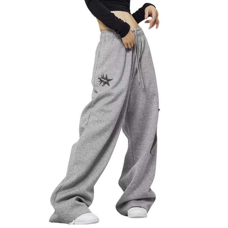 Indulge in luxurious comfort with our Women's Star Patch Sweatpants. Made from premium materials, these sweatpants feature a unique star patch design for added style. Perfect for lounging or running errands, these sweatpants are a must-have for any fashion-forward woman. Elevate your wardrobe and make a statement with our Women's Star Patch Sweatpants. Features: -55% Polyester,45% Acrylic -Adjustable Waistband -Straight Leg -Star Print -MId-rise waist -Regular fit -Classic style Streetwear Wide Leg Bottoms With Star Print, Wide Leg Bottoms With Star Print For Streetwear, Star Print Wide Leg Bottoms For Streetwear, Wide Leg Star Print Bottoms For Streetwear, Wide Leg Cotton Pants With Star Print, Cotton Star Print Pants For Streetwear, Cotton Wide Leg Pants With Star Print, Cotton Wide-leg Pants With Star Print, Cotton Bottoms With Star Print For Streetwear