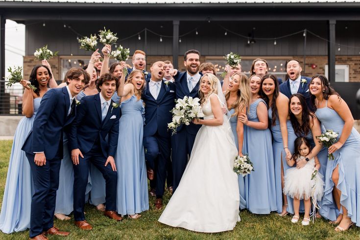 a large group of people posing for a photo