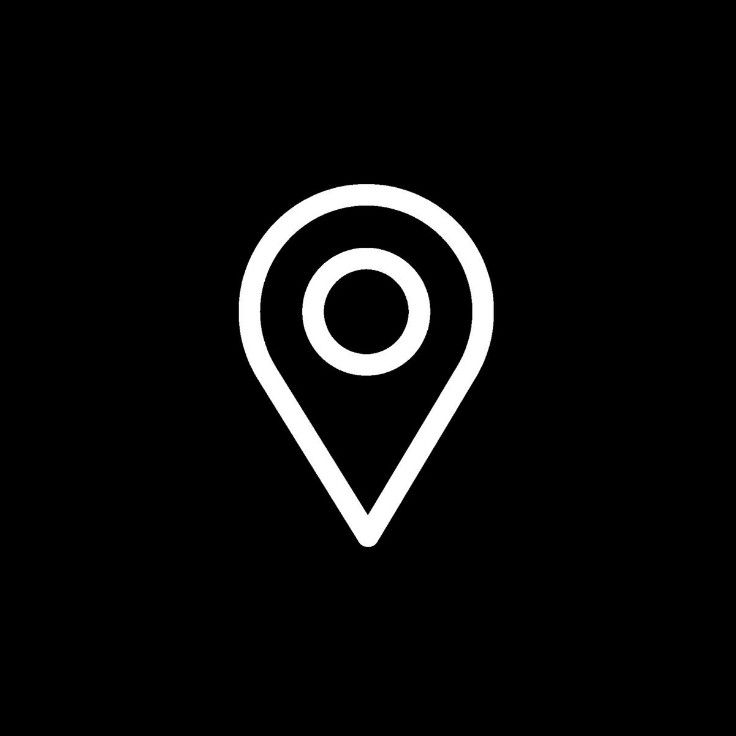 a black and white map pin icon with the letter o in it's center