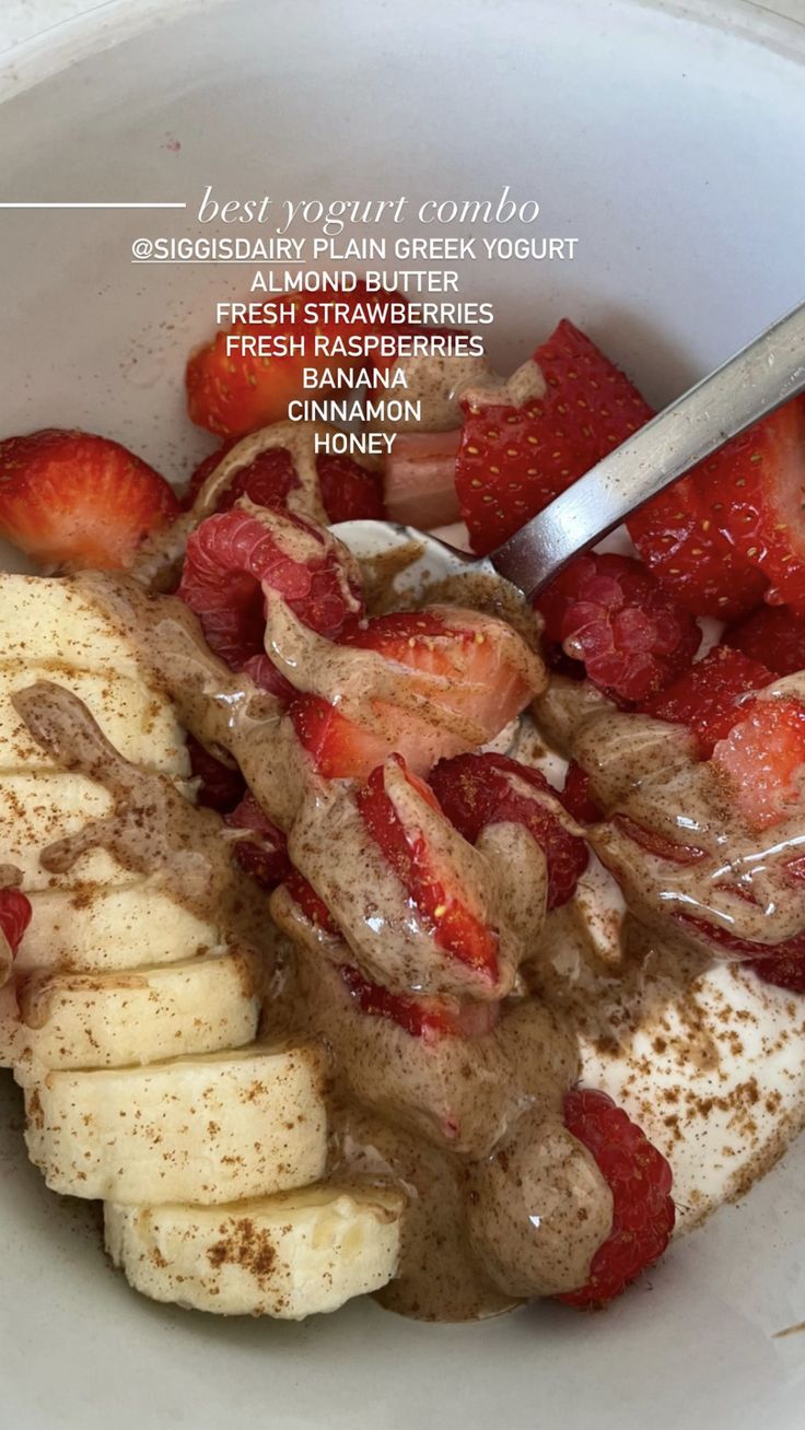 a bowl filled with bananas and strawberries