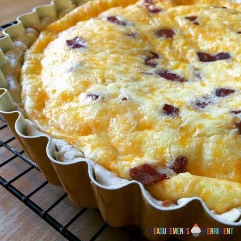 a quiche sitting on top of a cooling rack