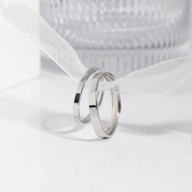 Material: High-Quality Solid 925 Sterling Silver (Nickel-Free and Lead-Free)Color: SilverWidth: 3.0mm and 1.9mm 1.9mm Ring Size: Adjustable, Suitable for Sizes from 3 to 102.8mm Ring Size: Adjustable, Suitable for Sizes from 5 to 14Packaging: Complimentary Gift Box and Jewelry Pouch Care Instructions: Sterling silver can be worn in the shower and will not rust. Silver will oxidize naturally, use a gentle silver cleanser or a silver polishing cloth to clean and re-shine as needed. Store your jewe Minimalist Polished Couple Promise Rings, Minimalist Sterling Silver Couple Rings, Minimalist Couple Rings With Polished Finish, Minimalist White Gold Couple Rings With Polished Finish, Modern Silver Midi Rings For Wedding, Minimalist Stackable Couple Rings For Anniversary, Minimalist Sterling Silver Couple Rings For Anniversary, Minimalist Stackable Sterling Silver Couple Rings, White Gold Hypoallergenic Midi Rings For Wedding