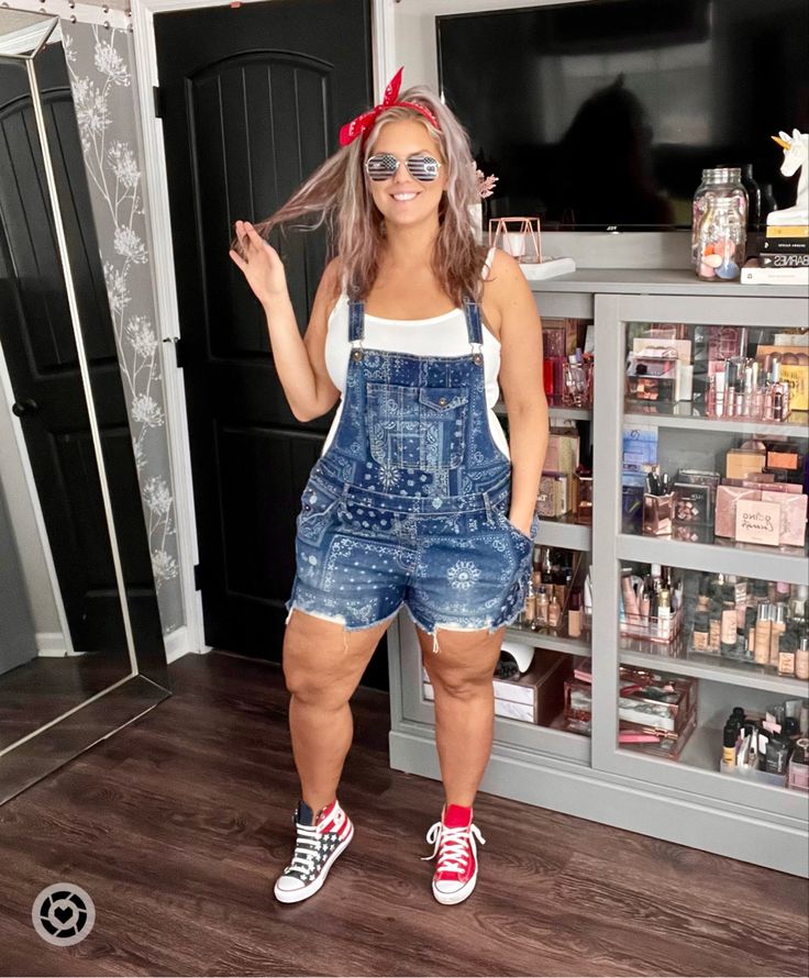 Click Photo to Shop! Patriotic, red white and blue, memorial day, fourth of july, america, american flag, flag, overalls, shortalls, jean shorts, converse, high tops midsize, curvy, outfit, idea, inspo, inspiration, outfit of the day, ootd, midsize ootd, curvy ootd, midsize outfit, curvy outfit, size 12, size 14, size 16, size18 Overall Shorts Outfit Midsize, Midsize Romper Outfit, Shorts Overalls Outfit, Midsize Ootd, Ootd Midsize, White Blue Outfit, Lake Outfit Summer, Overall Shorts Outfit, Red White Blue Outfit