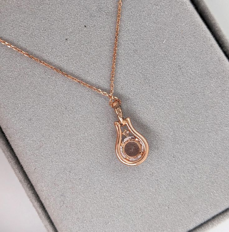 This cute pendant features a 0.70 carat pink Morganite with natural earth mined diamonds set in solid 14K gold. This Morganite pendant makes a beautiful June birthstone gift for your loved ones! This pendant is made with solid 14k Gold and natural Earth mined SI / G-H diamonds. As listed, this pendant is ready to ship. If you're interested in purchasing this setting with a different center stone please message us! Rose Gold Teardrop Pendant With Brilliant Cut, Rose Gold Diamond Birthstone Necklace For Anniversary, Rose Gold Diamond Necklace For Anniversary Gift, Anniversary Rose Gold Diamond Birthstone Necklace, Rose Gold Jewelry With Diamond Accents For Anniversary, 14k Rose Gold Pendant Jewelry Gift, Diamond Pendant Birthstone Necklace Gift, Rose Gold Birthstone Pendant Necklace, Pink Gold Jewelry With Diamond Accents As Gift