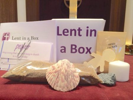 a table with some items on it including soap, candles and other things to put in the box