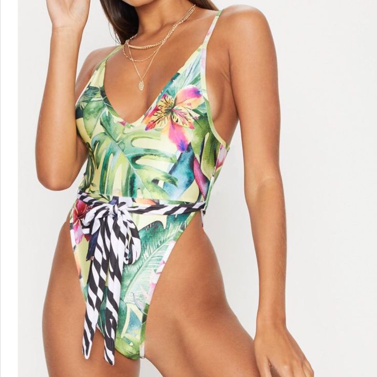 New Sexy One Piece Size Small Tropical Print High Rise New But Tsk Detached Brand New Without Tags Tropical Print Swimwear For Summer Party, Summer Party Swimwear With Tropical Print, Sleeveless Tropical Print Swimwear For Party, Summer High Waist Beachwear Bodysuit, High Waist Summer Beachwear Bodysuit, Tropical Print Beachwear For Parties, Summer High-waist Beachwear Bodysuit, High-waist Beachwear Bodysuit For Summer, Tropical Sleeveless Swimwear For Party