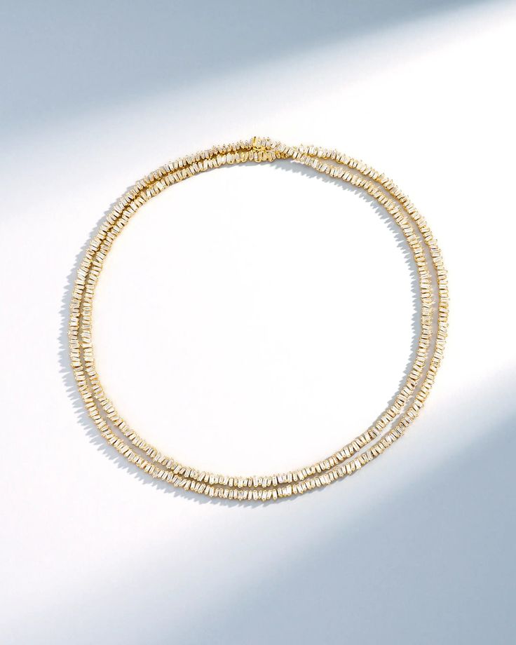 Crafted in 18-karat gold, this tennis necklace features 20.50 carats of white diamond baguettes, meticulously set to encircle the entire piece. Its versatile design allows you to wear it long or double it for a layered effect, effortlessly enhancing any outfit. Details 18k yellow gold, rose gold or white gold 20.50 carats of white diamond baguettes Measures 36" inches in length and can be doubled up Box clasp with safety lock fastening 5mm width Ref: BAP518-36 Diamond Tennis Necklace, Ruby Sapphire, Tennis Necklace, Baguette Diamond, Ring Bracelet, Diamond Wedding Bands, White Diamond, Diamond White, Ring Shopping